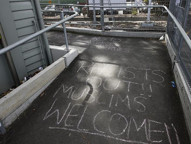 Batman Station chalked slogans