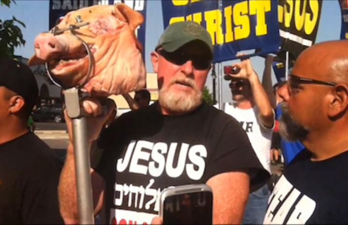 Bible Believers display pig's head