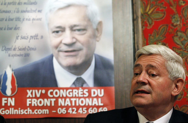 France's far-right National Front political executive director Bruno Gollnisch candidate to succeed Jean Marie Le Pen,attends a news conference in Lens