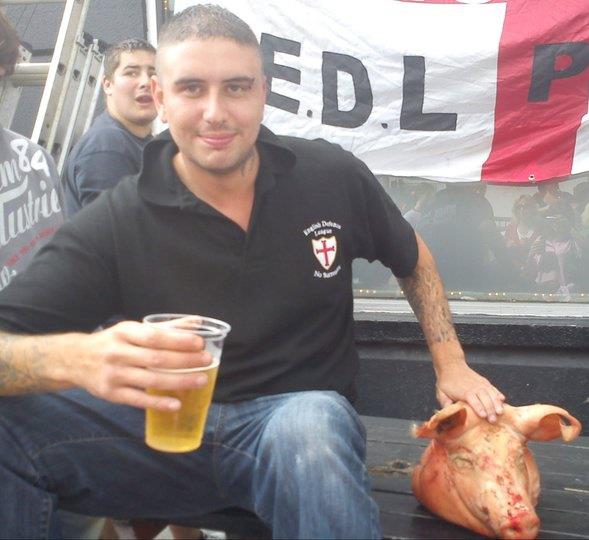 Kieran Hallett with pig's head