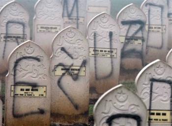 Muslim graves defaced